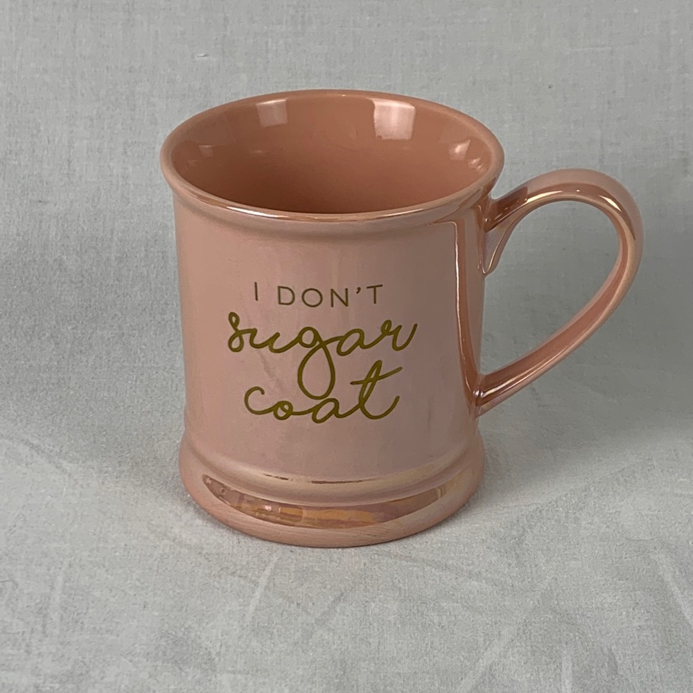 Chic Peach/Pink Mug with Gold Accent Says “I Don’t Sugar Coat”.